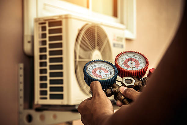 Professional Hvac technician working in Peabody, MA